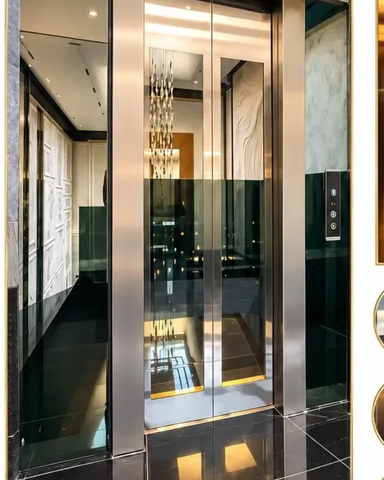Glass Door Elevator by Hub Elevator